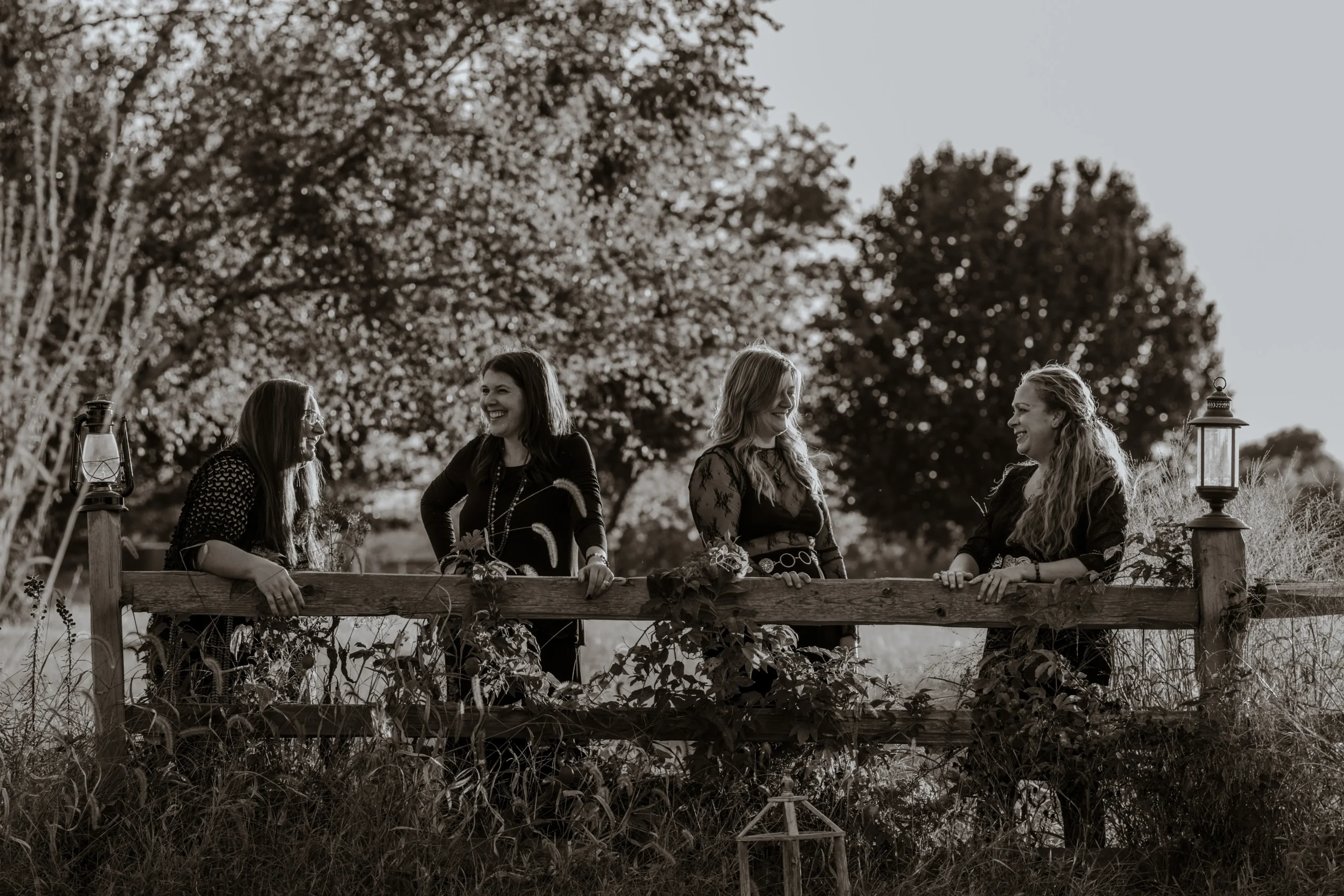 The four Mystic Sisters sharing a candid moment together.